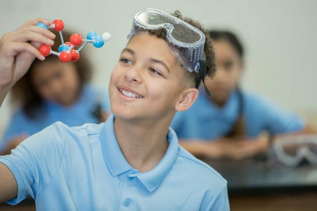 Students learning in a classroom — image 4