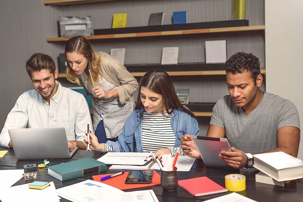 Students learning in a classroom — image 1